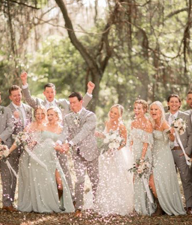 wedding trees pink dress bridesmaids smiling champagne rain best group bridal airbrush spray tan party in Sharpes Florida