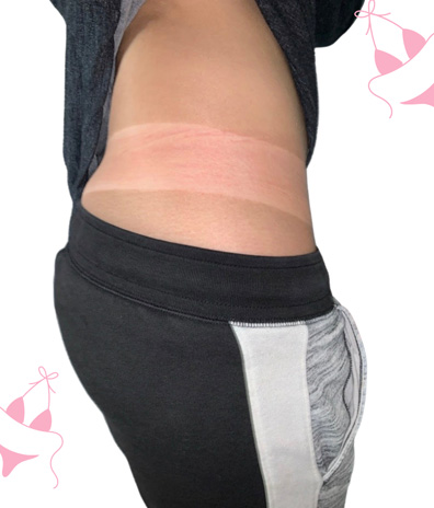 black & white and gray sweatpants large tan lines airbrush spray tan woman sunless girl showing her tan line